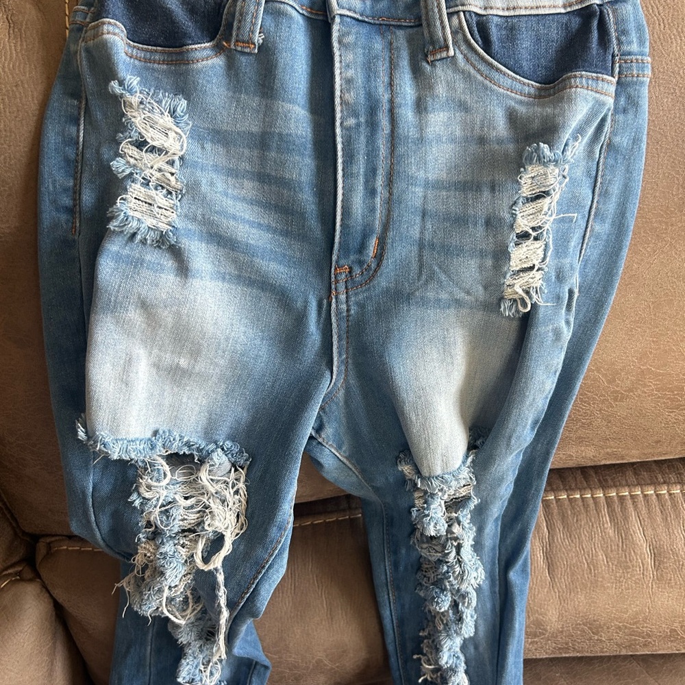 Distressed Blue Denim Jeans